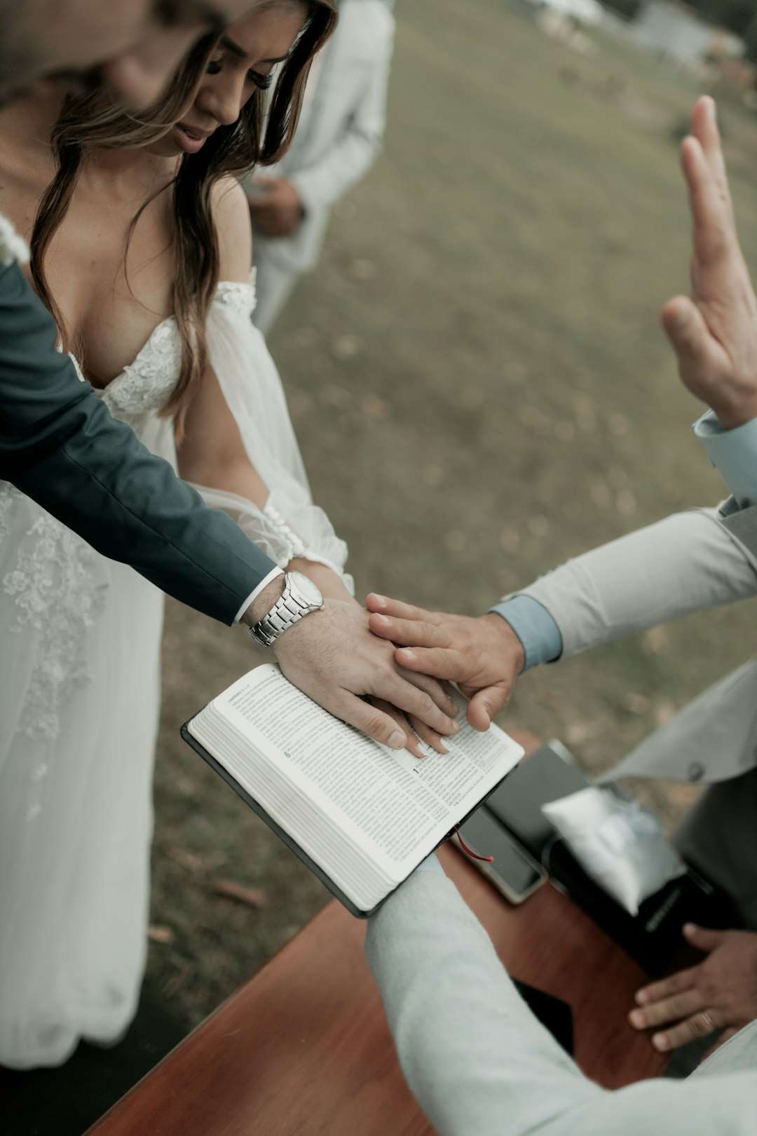 services-03 a-bride-and-groom-holding-hands-at-a-wedding-l4dufvx6h98